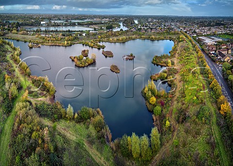 View east over the former Lambeth Reservoir of Molesey Reservoirs Nature Reserve with the River Thames beyond West Molesey Surrey England