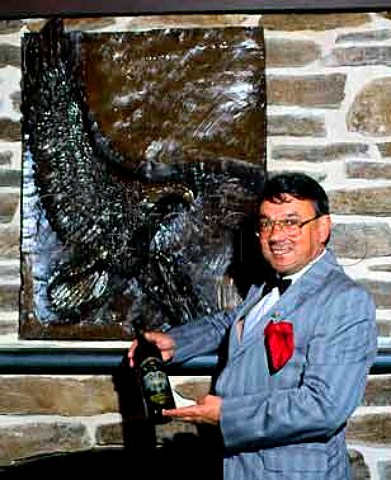 Wolf Blass with bottle of his Black Label  a   Cabernet SauvignonShirazMerlot blend   The eagle is the symbol of his company   Nuriootpa South Australia  Barossa Valley