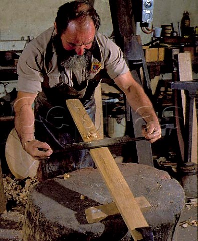 Cooper shaping a barrel stave with a spokeshave  Penfolds winery Nuriootpa South Australia  Barossa Valley