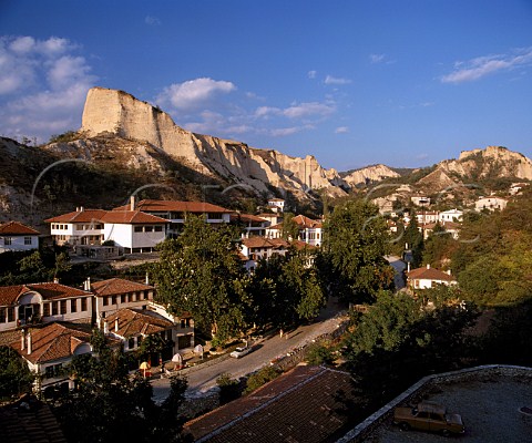 Surrounded by sandstone cliffs the museum town of   Melnik is in the foothills of the Pirin Mountains in   the south west corner of Bulgaria  Struma Valley