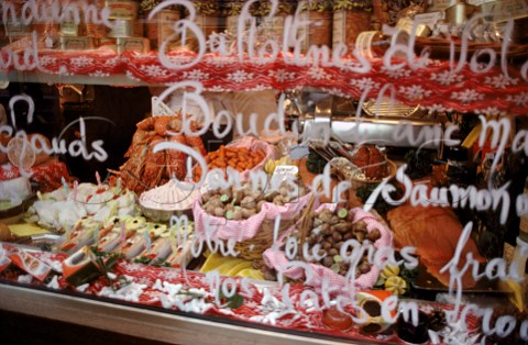 Charcuterie shop window display decorated for Christmas Paris France