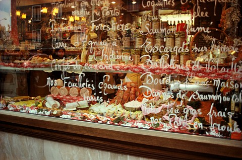 Charcuterie shop window display decorated for Christmas Paris France