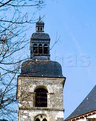 The tower of the abbey church in the Champagne   village of Hautvillers Dom Perignon worked here and   his tomb is in the church