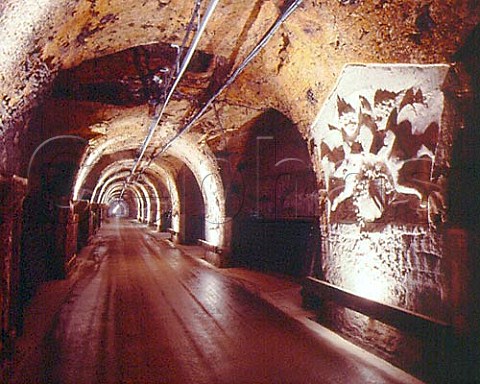 The Gallerie de Pekin part of the vast cellars of   Champagne Mercier 20 metres below ground at   Epernay A laser guided train has been installed to   give tours of the cellars to visitors