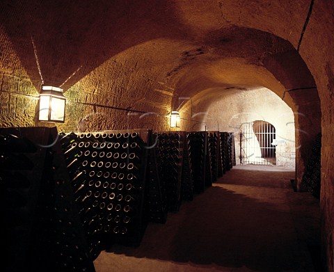 Bottles in pupitres in the cellars of   Champagne Mercier pernay Marne France