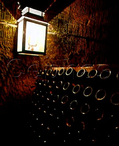 Bottles in pupitres in the vast cellars of Champagne   Mercier 20 metres below ground at Epernay