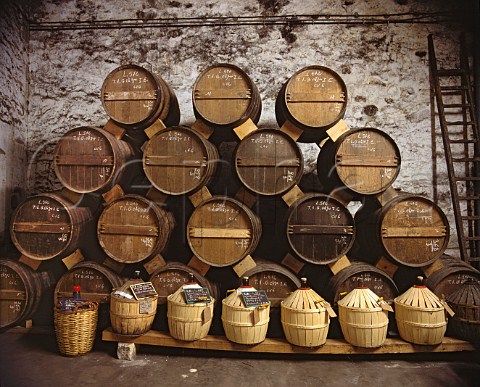 Cognac from the Grande Champagne area ageing in   barrel in one of the many warehouses of Courvoisier   in Jarnac Charente France