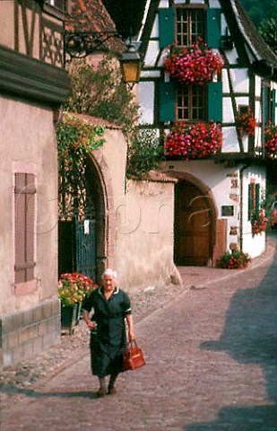 Woman in street Kaysersberg   HautRhin France Alsace