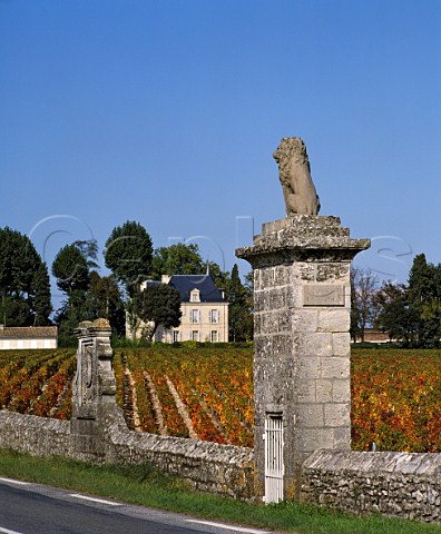 Vineyard of Chteau Latour with Chteau PichonLonguevilleComtessedeLalande beyond The monuments in the wall signify the end of Chteau LovillelasCases vineyards in the commune of StJulien and the start of Latour in Pauillac  Gironde France  Mdoc  Bordeaux