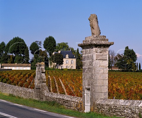 Vineyard of Chteau Latour with ChteauPichonLonguevilleComtessedeLalande beyond The monuments in the wall signify the end of Chteau LovillelasCases vineyards in the commune of StJulien and the start of Latour in Pauillac  Gironde France  Mdoc  Bordeaux