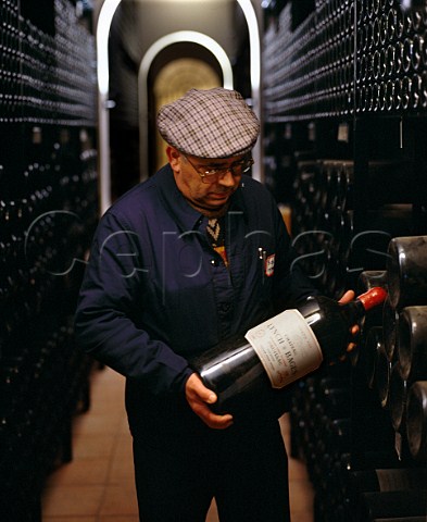 Cellarmaster taking an Imperial 6 litres from the wine library of Chteau LynchBages Pauillac Gironde France   Mdoc    Bordeaux