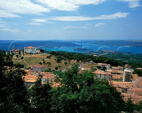 View over the roofs of Aiguines to Lac de SteCroix  a lake formed by damming the Verdon River after its exit from the Grand Canyon du Verdon  Var France