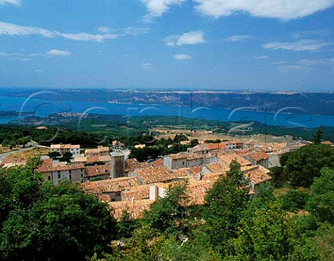 View over the rooftops of Aiguines to Lac de  SteCroix  a lake formed by damming the Verdon River after its exit from the Grand Canyon du Verdon  Var France