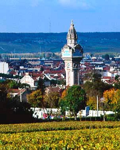 The tower of Champagne de Castellane viewed over   vineyard of Champagne Mercier in the centre of   Epernay
