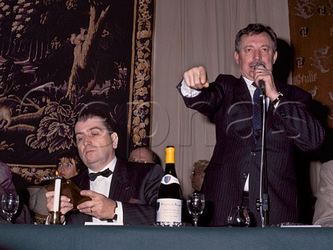 Auctioneers at the Hospices de Beaune charity wine auction the length of bidding for each lot is determined by the burning of small wicks which protrude from the wooden box   Beaune Cte dOr France 