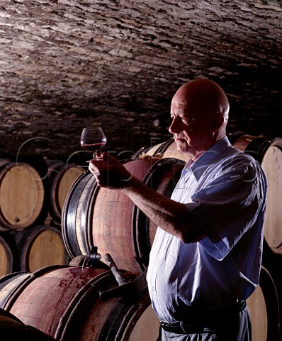 Hubert de Montille died 2014 checking on the progress of his   premier cru Taille Pieds in barrel in his cellar at   Volnay Cte dOr France   Cte de Beaune