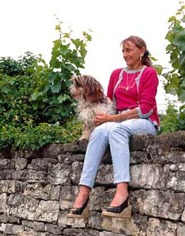 Lalou BizeLeroy and Basil on the wall at the top   of her parcel of the Grand Cru Richebourg vineyard   VosneRomane Cte dOr France Cte de Nuits