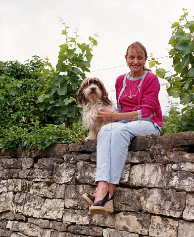 Lalou BizeLeroy and Basil on the wall at the top   of her parcel of the Grand Cru Richebourg vineyard   VosneRomane Cte dOr France Cte de Nuits