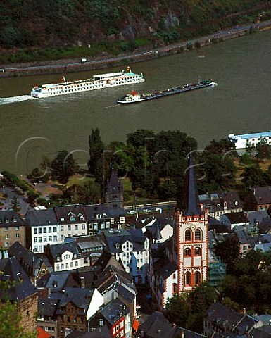 Town of Bacharach with passenger cruiser and barge   on the River Rhine Germany   Mittelrhein