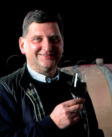Karl Heinz Johner with glass of his Blauer   Spatburgunder Pinot Noir taken from barrique   Bischoffingen Baden Germany   Kaiserstuhl