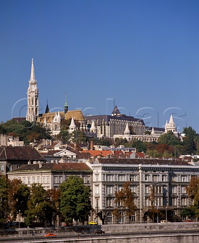 View across the Danube from Pest to Buda on the hill are St Matthias Church Hilton Hotel and Fishermans Bastion  Budapest Hungary