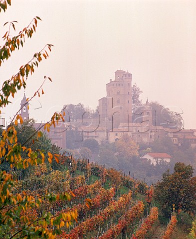 Serralunga dAlba and its castle in the autumn mist Piemonte Italy   Barolo