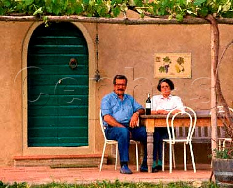 Piermario Meletti Cavallari former owner of Grattamacco with his wife on their terrace   Castagneto Carducci Tuscany Italy   Bolgheri