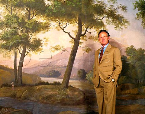 Marchese Piero Antinori in front of a mural in the   headquarters of his company the   Palazzo Antinori in the centre of Florence Tuscany   Italy