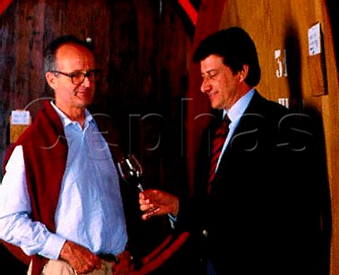 Itinerant winemaker Franco Bernabei in the cellars   of the Chianti Rufina estate of Selvapiana along with   its owner Francesco Giuntini left Pontassieve   Tuscany Italy