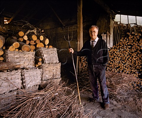 Aldo Conterno died 2012 in his wood store This is used to fuel the oven that bakes the bread for his family and estate workers Monforte dAlba Piemonte Italy