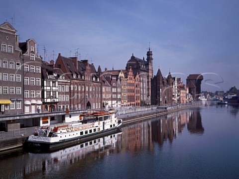 View from the Green Bridge along the Motlawa River   promenade to the Crane Gate Gdansk Poland