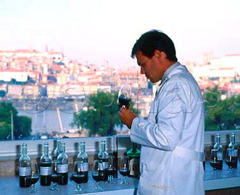 Oenologist Luis de Sottomayor blending Ferreiras   Quinta da Porto 10year old port in their laboratory   overlooking Porto and the Douro River   Vila Nova de   Gaia Portugal