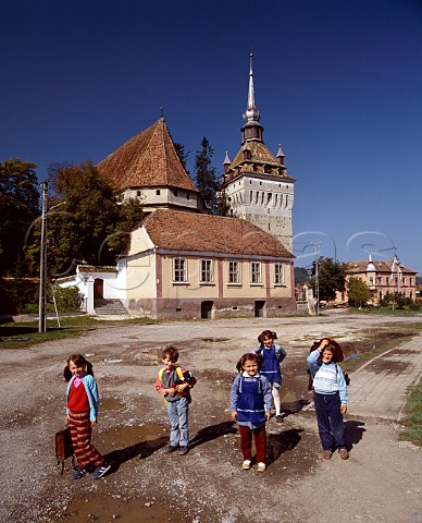 Young children returning home from school   Saschiz Transylvania Romania
