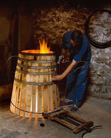 Barrelmaking  the fire allows the staves to be   bent into place   Bodegas Muga Haro Spain   Rioja