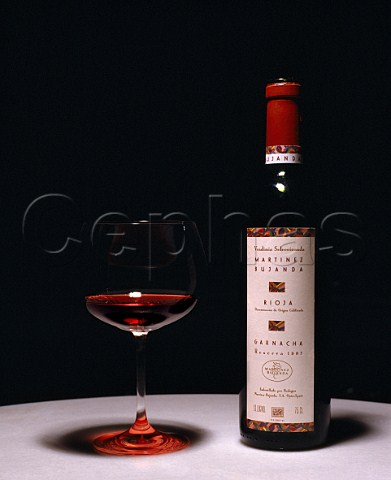 Bottle and glass of Martinez Bujanda Garnacha 1987   in their tasting room Oyon Spain  DOC Rioja