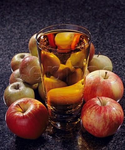 Glass of cider with apples