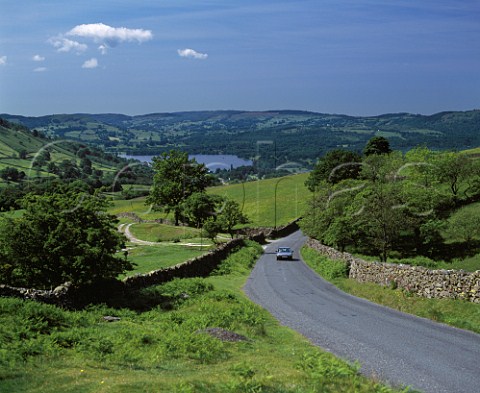 Road to Ambleside and Lake Windermere from Kirkstone Pass  Lake District Cumbria England