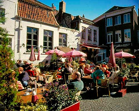 Open air caf in the tanners square huidenvetters next to Steenhouwers canal in the centre of Bruges Belgium