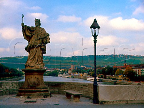 Statue on the Old Bridge with river Main and Stein   vineyard beyond  Wrzburg Germany   Franken