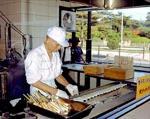 Making Kamaboko boiled fish paste cakes by hand a   snack famous in the Matsushima area  Miyagi   Prefecture Tohoku Japan