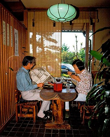 Tokyo Japan A couple eating soba Japanese   noodles in a specialist noodle restaurant