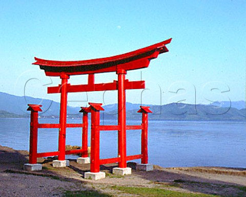 Torii gate in front of Gozanoishi Temple on the   shore of Tazawako Lake the deepest lake in Japan   at 4234m Hachimandai National Park Akita   Prefecture Tohoku Japan