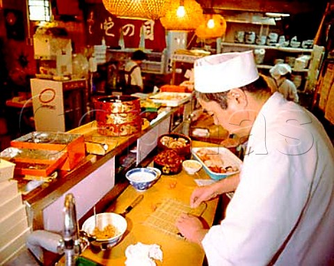 Making norimaki behind the counter in a sushi  restaurant in Miyako Iwate Prefecture Tohoku Japan