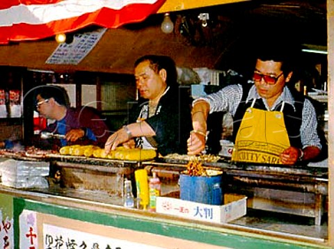 Fast food  Stall selling squid  cornonthecob  Nagano Japan