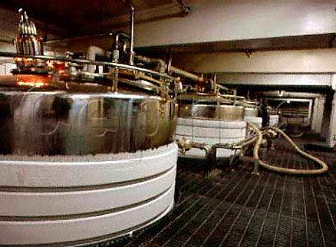 Refrigerated fermentation tanks used for storing   wine for most of the year at Suntorys Yamanashi   winery near Kofu Yamanashi Prefecture  Japan