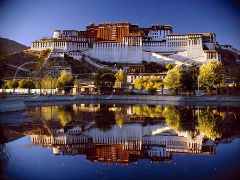 Potala Palace reflecting in Peoples Park lake Lhasa Tibet