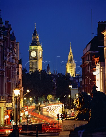 Looking down Whitehall from Trafalgar Square with   Big Ben St Stephens Tower and the Houses of   Parliament beyond  London England