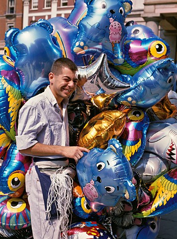 Man selling balloons in Covent Garden London England