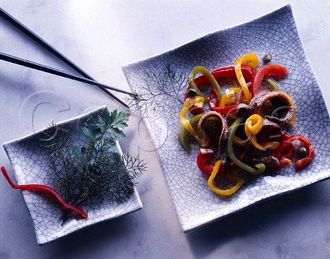 Japan Stir fried anchovies and peppers on grey Raku plates