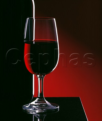 Bottle and glass of red wine